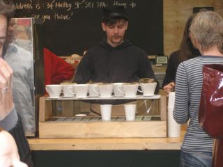 This coffee stand, one of two locations in the market, was so popular it had lines wrapping around the block. They make individual cups of drip filter coffee, pouring water into the funnels on top, letting it drip into cups below.